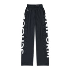 Kids Lounge Pants — Black AOP with Bold 'SCHOOL' and 'UNIFORM' side strips